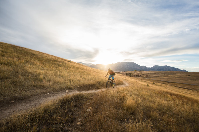 Man riding on Marshall Mesa bike trails in Boulder, Colorado