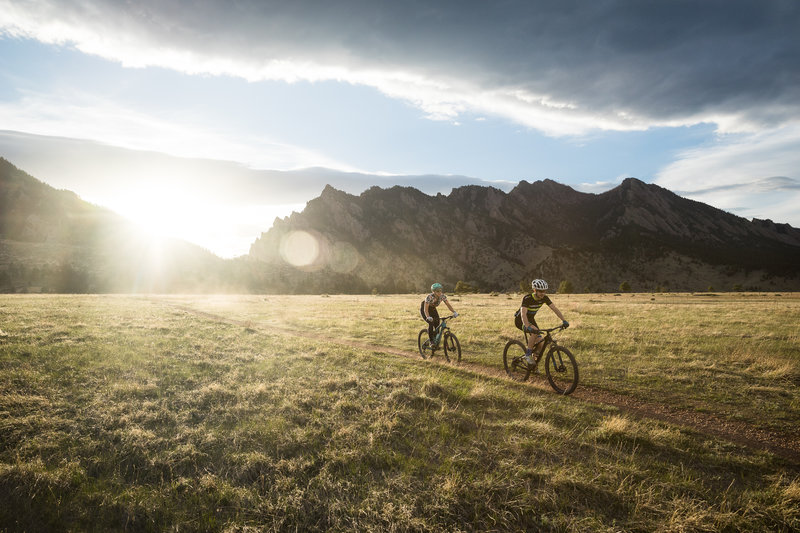 Two people biking in a field at Springbrook Loop, Colorado