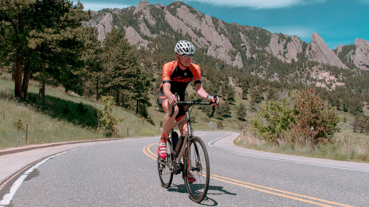 Lennard Zinn benefiting from riding an e-bike near the mountains