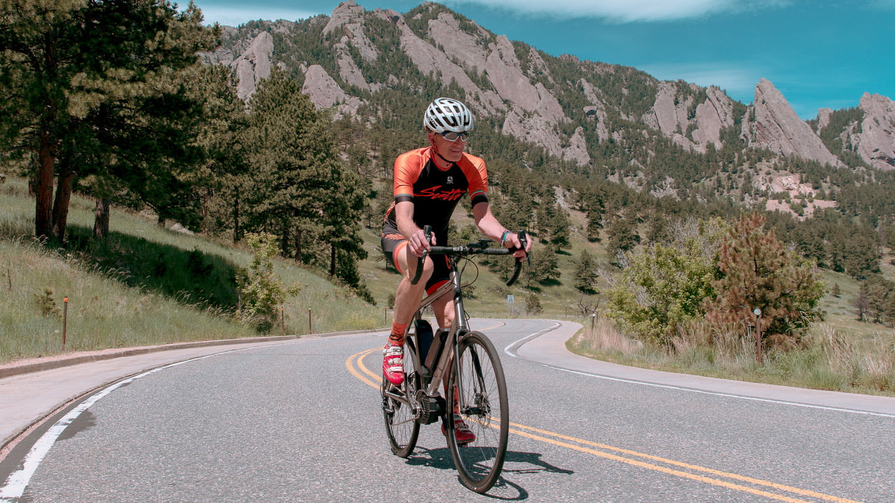 Lennard Zinn benefiting from riding an e-bike near the mountains