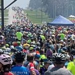 ragbrai group riders passing through town