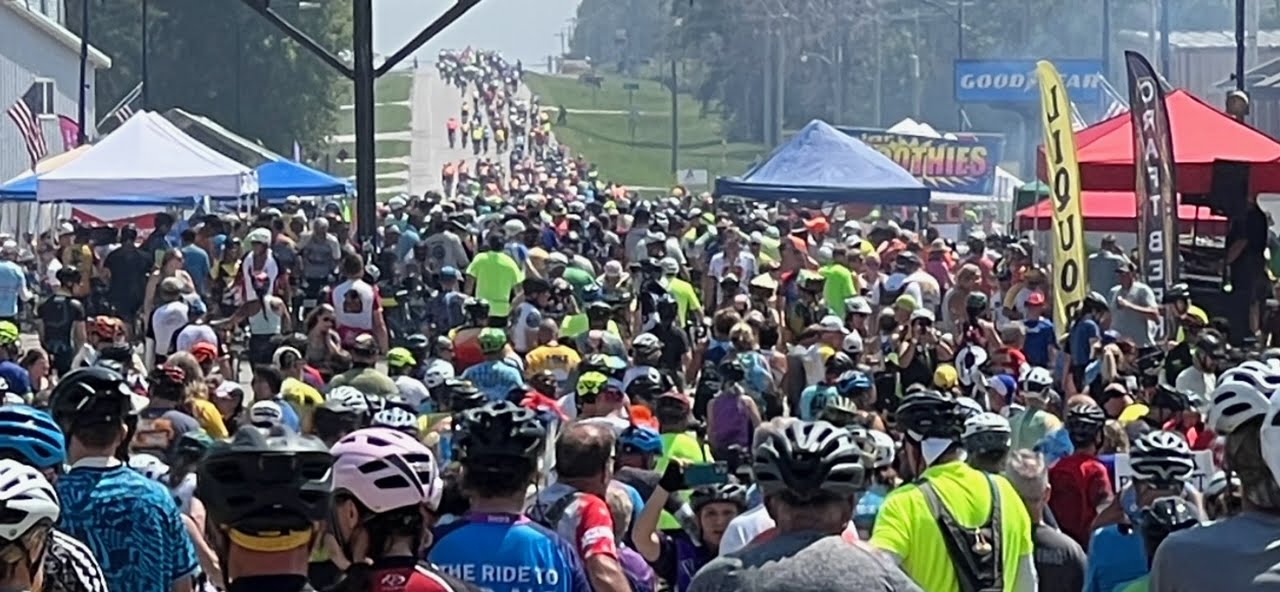 ragbrai group riders passing through town